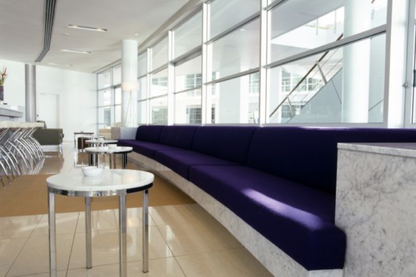 Purple banquette seating in a commercial lobby