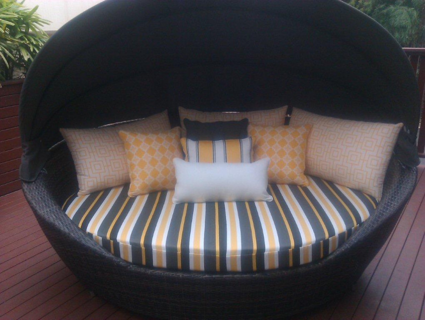 Outdoor daybed with custom striped cushions
